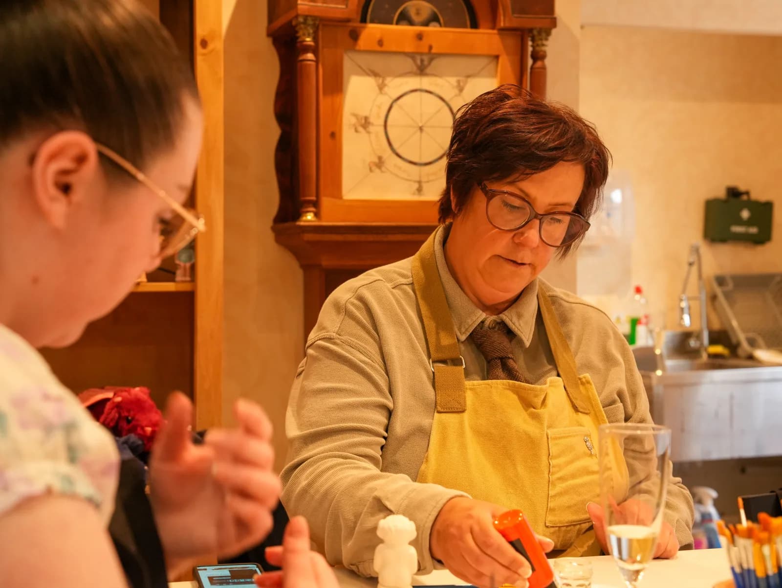 One of our Imp Catchers guiding a guest through the painting